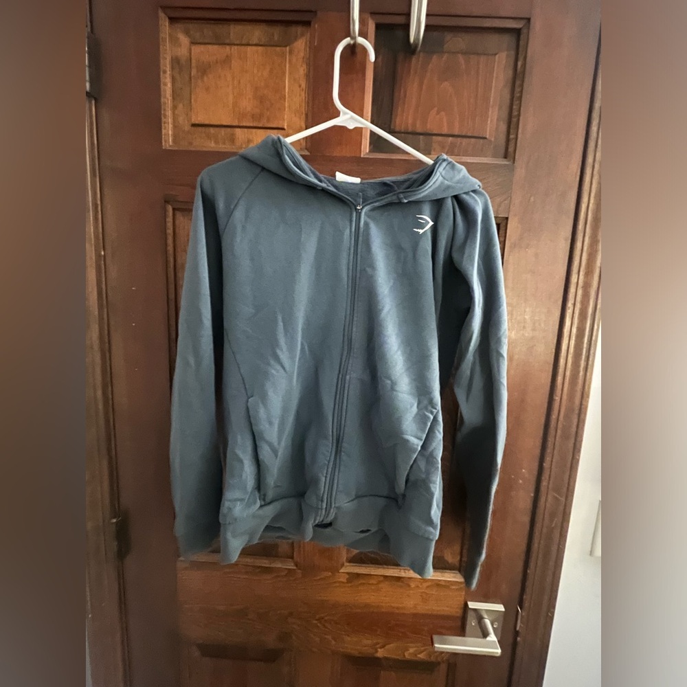 Blue full-zip Gymshark hoodie